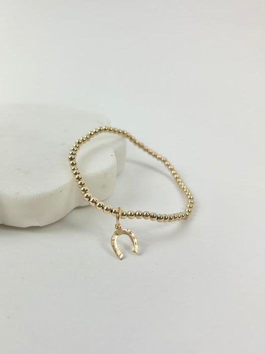 Beaded Blondes Horseshoe Charm Bracelet Bracelets in at Wrapsody