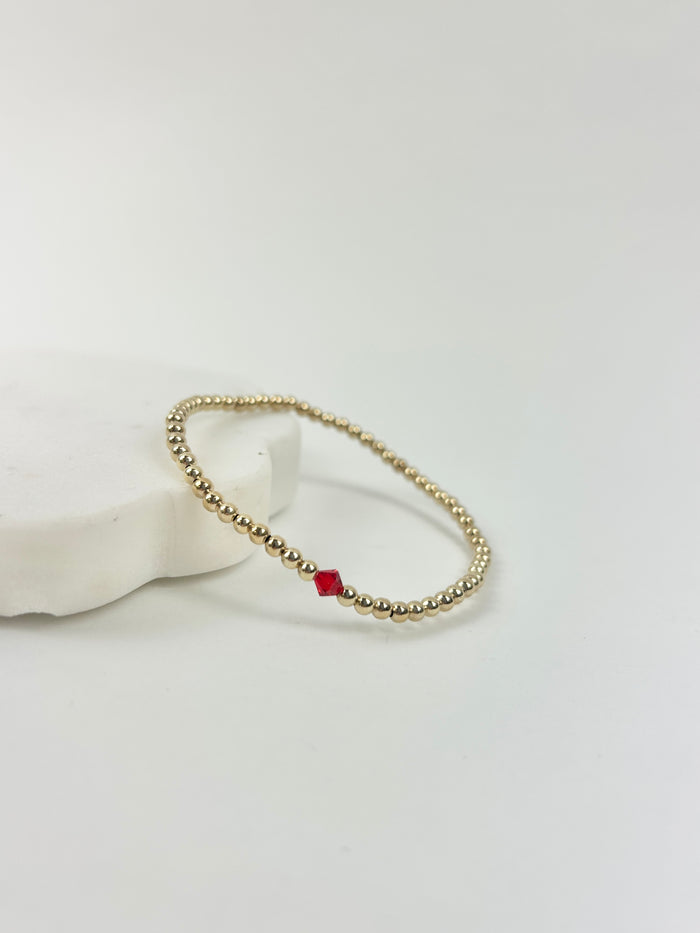 Beaded Blondes July Ruby Birthstone Bracelet Bracelets in at Wrapsody