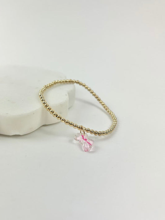 Beaded Blondes Pink Bow Charm Bracelet Bracelets in at Wrapsody