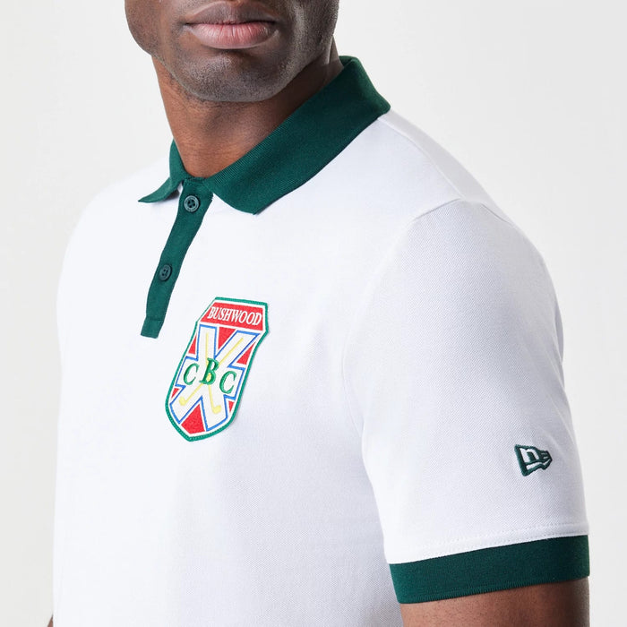 The Male model is wearing Caddyshack BushWood White Polo T-Shirt 4