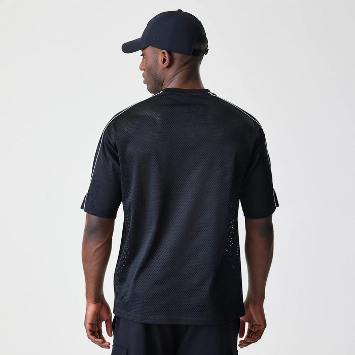 The Male model is wearing Chicago Bulls NBA Piping Black Oversized T-Shirt 2