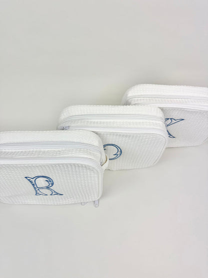Fairfax Blue Initial Waffle Knit Cosmetic Bag Travel Accessories in at Wrapsody
