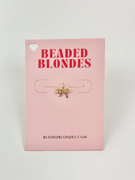 Interchangeable Gold Bow Charm Necklaces in at Wrapsody