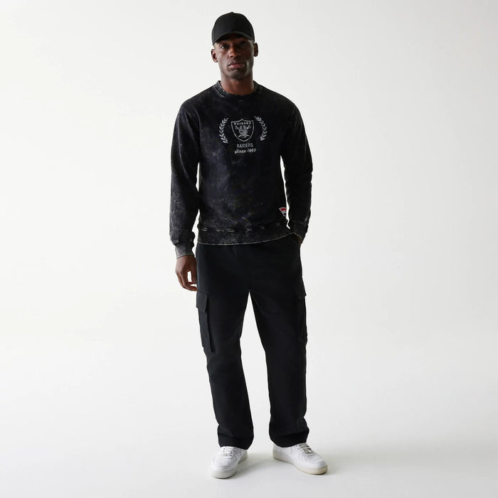 The Male model is wearing Las Vegas Raiders NFL Throwback Black Crew Neck Sweater 6