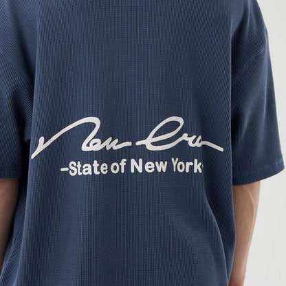 The Male model is wearing New Era Basic Blue T-Shirt 3