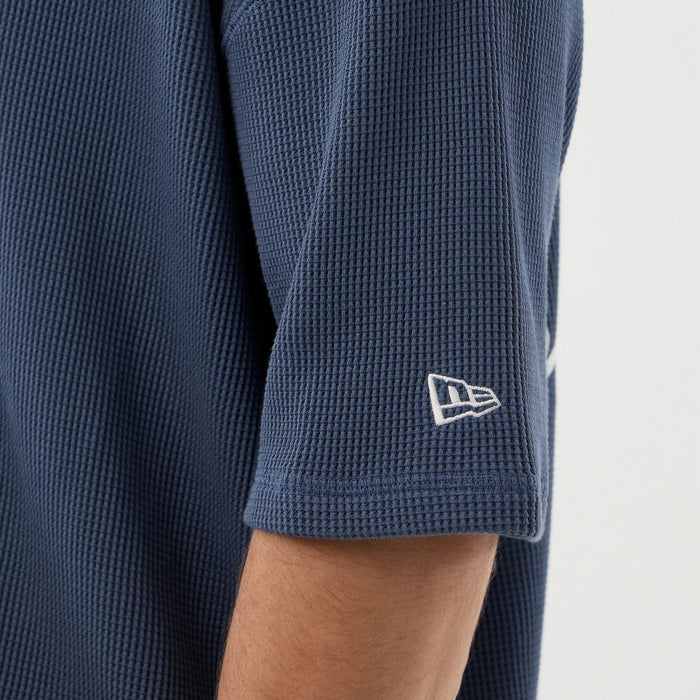 The Male model is wearing New Era Basic Blue T-Shirt 4