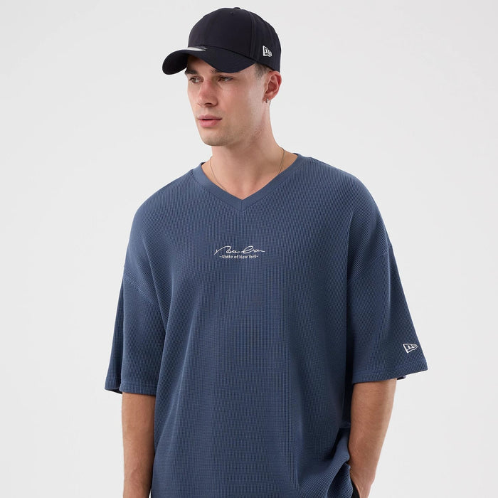 The Male model is wearing New Era Basic Blue T-Shirt 5