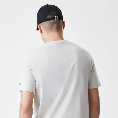The Male model is wearing New Era Burger Graphic Cream T-Shirt 7