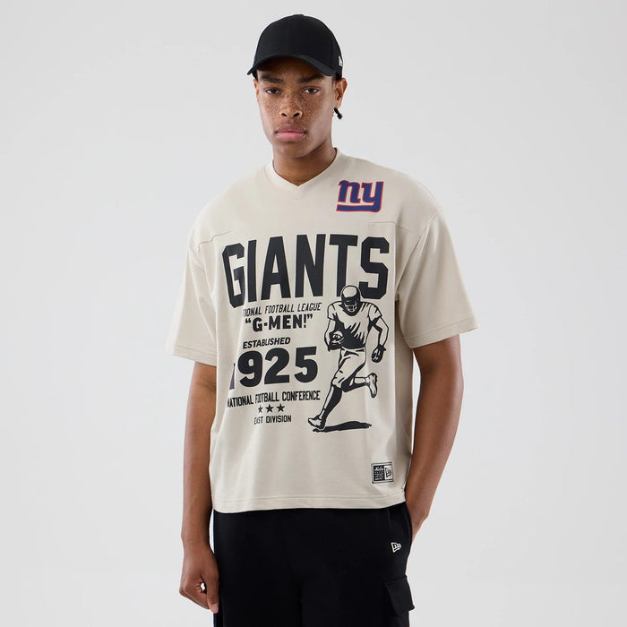 The Male model is wearing New York Giants NFL Throwback Prep Light Beige T-Shirt 1