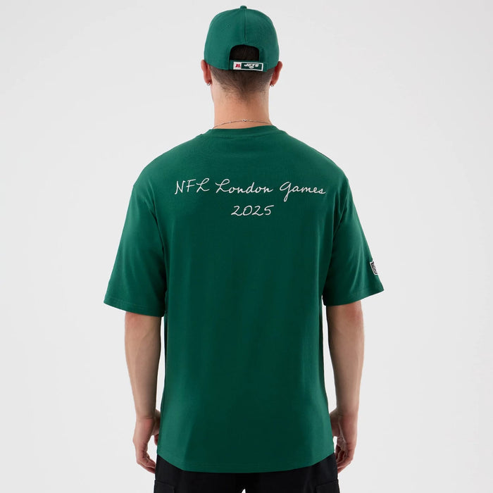 The Male model is wearing New York Jets NFL International Series Games Green Oversized T-Shirt 2