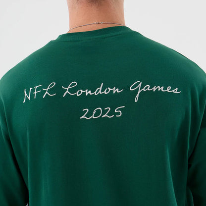 The Male model is wearing New York Jets NFL International Series Games Green Oversized T-Shirt 7