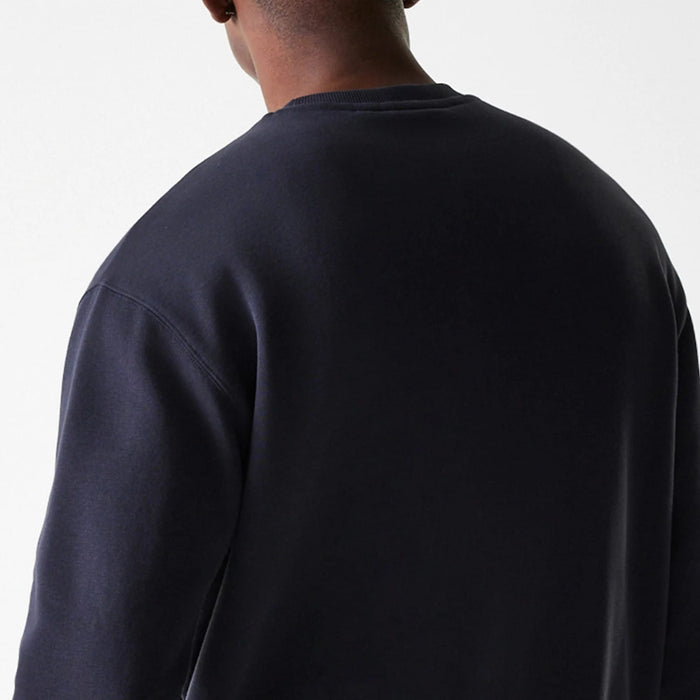 The Male model is wearing New York Yankees MLB League Essential Navy Crew Neck Sweater 7