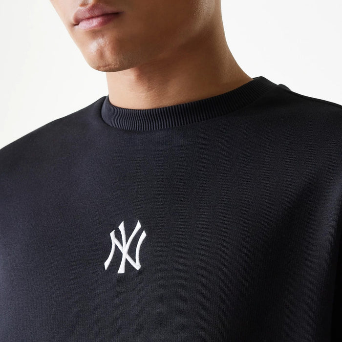 The Male model is wearing New York Yankees MLB League Essential Midi Black Oversized Crew Neck Sweater 3