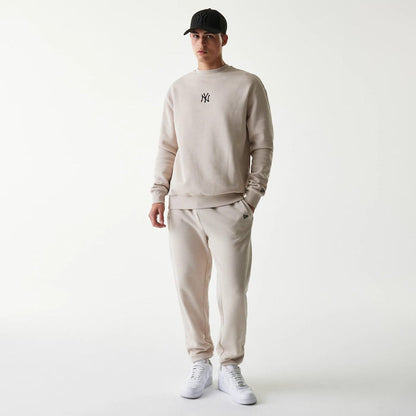 The Male model is wearing New York Yankees MLB League Essential Midi Cream Oversized Crew Neck Sweater 8