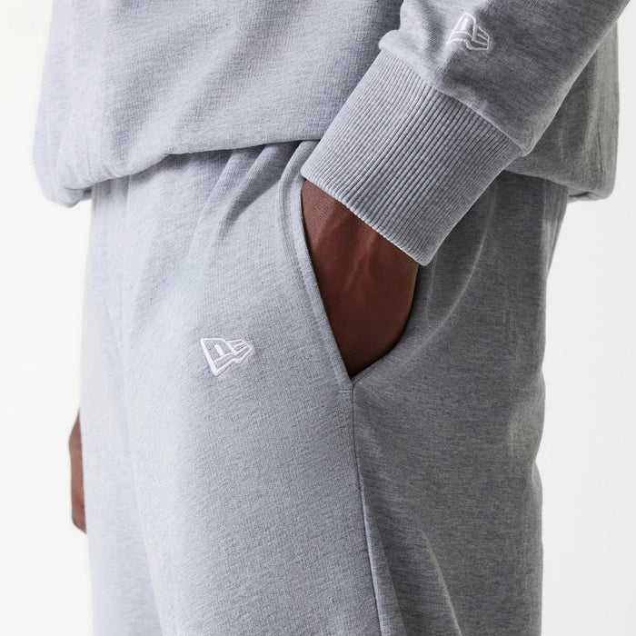 The Male model is wearing New York Yankees MLB League Essential Midi Grey Joggers 5