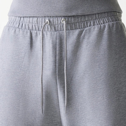 The Male model is wearing New York Yankees MLB League Essential Midi Grey Joggers 6
