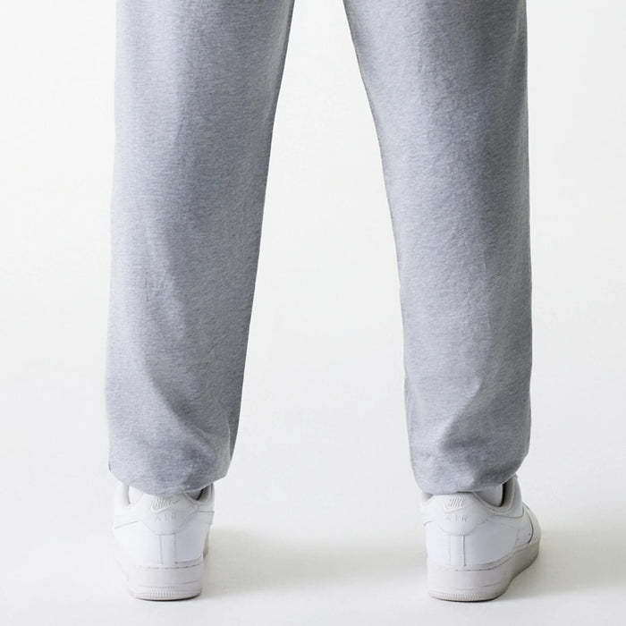 The Male model is wearing New York Yankees MLB League Essential Midi Grey Joggers 7
