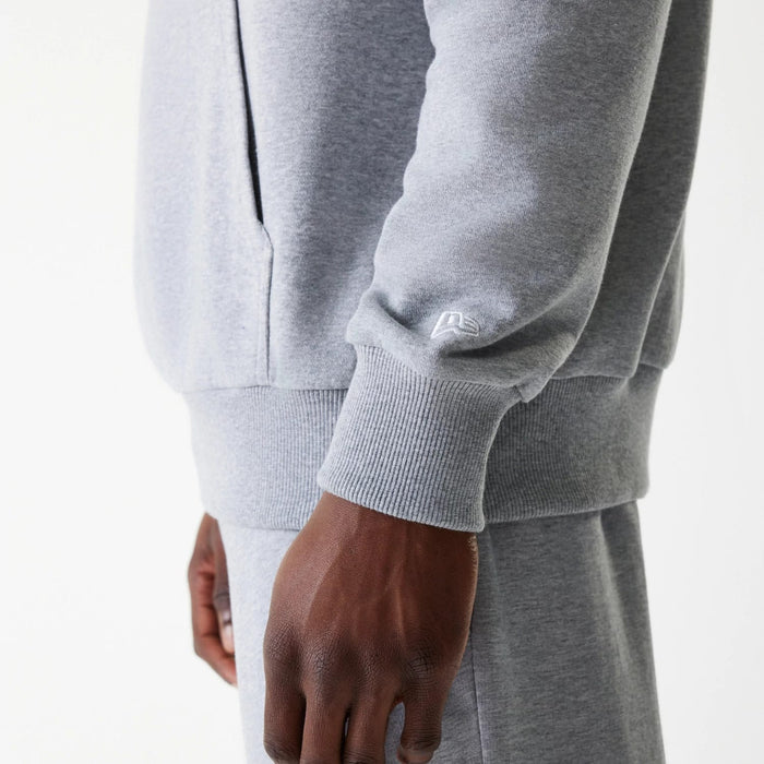 The Male model is wearing New York Yankees MLB League Essential Midi Grey Oversized Pullover Hoodie 5