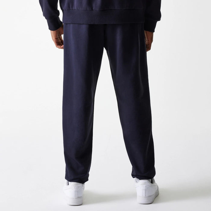 The Male model is wearing New York Yankees MLB League Essential Midi Navy Joggers 2