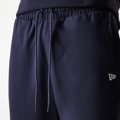 The Male model is wearing New York Yankees MLB League Essential Midi Navy Joggers 6