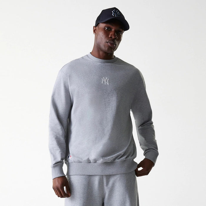 The Male model is wearing New York Yankees MLB League Essential Midi Grey Oversized Crew Neck Sweater 3