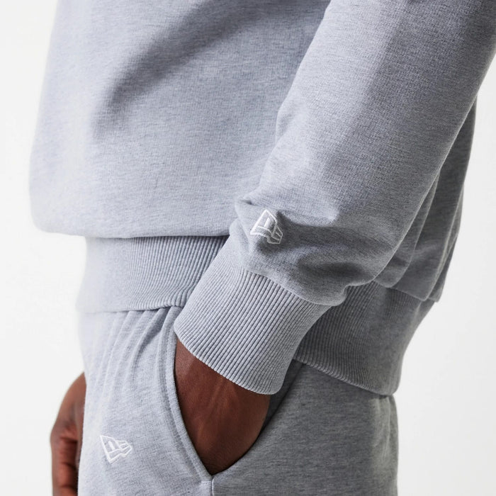 The Male model is wearing New York Yankees MLB League Essential Midi Grey Oversized Crew Neck Sweater 6