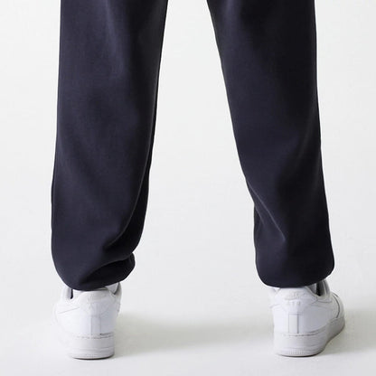 The Male model is wearing New York Yankees MLB League Essential Navy Joggers 7