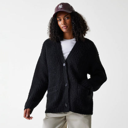 The Female model is wearing New York Yankees Womens MLB Knit Black Cardigan 1