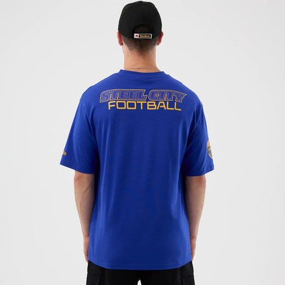 The Male model is wearing Pittsburgh Steelers NFL International Series Games Blue Oversized T-Shirt 2